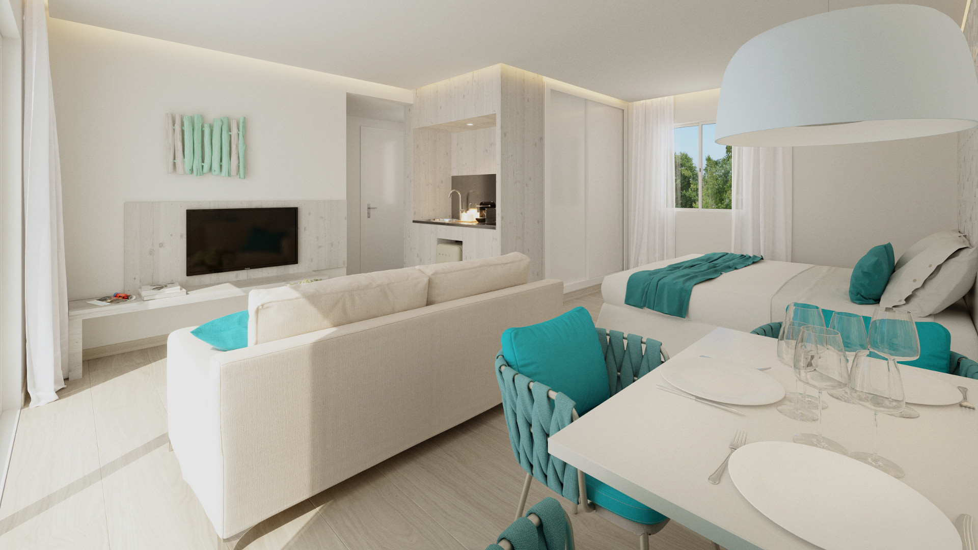 Zona de estar con sofa, televisión y mesa comedor junto a una cama doble de los estudios